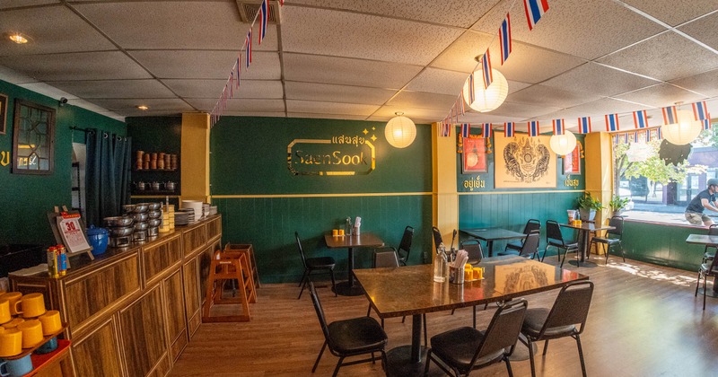 Interior, dining area, tables with chairs, counter on the left
