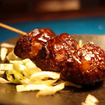 Grilled meat skewer, close up.