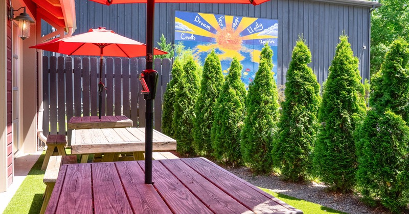 Exterior, picnic tables with parasols