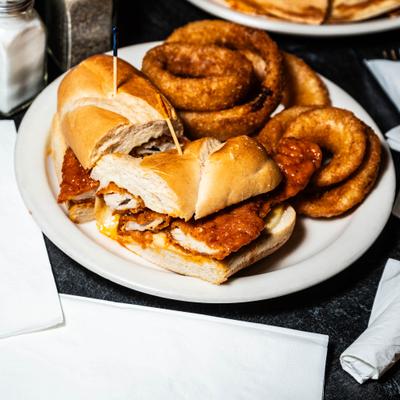 Hot Cheesy Stripper with Onion Rings.