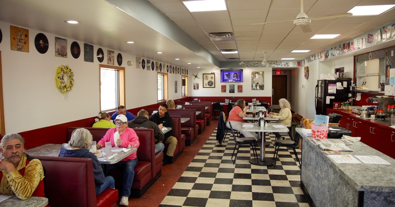 Customers dining and drinking