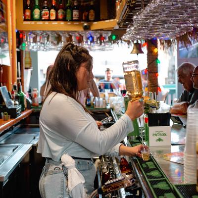 Bartender pouring shots