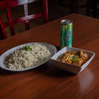 Goat Curry, with rice and soda.