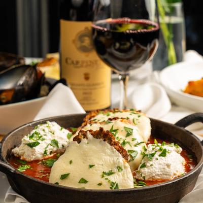 Meatballs with mozzarella, ricotta, reggiano and basil pomodoro.