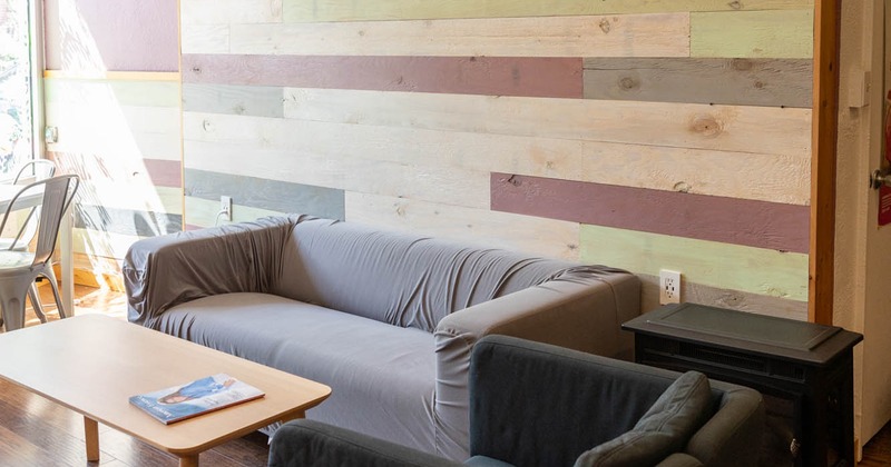 Interior, seating area, padded sofas and coffee table