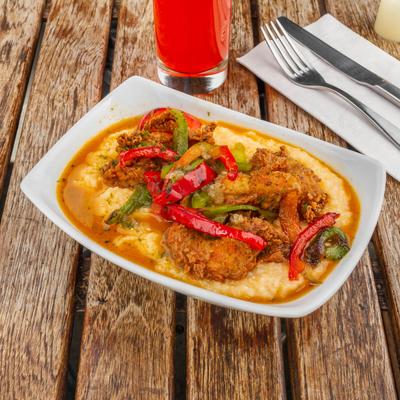 Vegan chicken, with bell peppers, and mash.