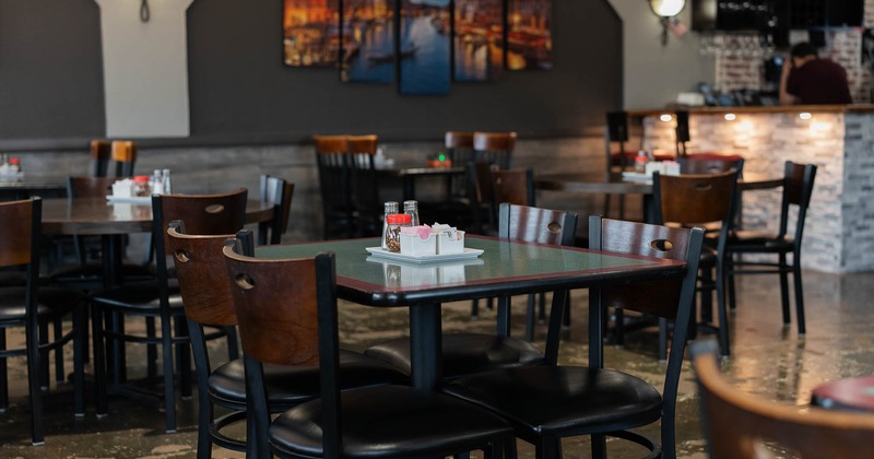 Interior, tables and chairs ready for guests