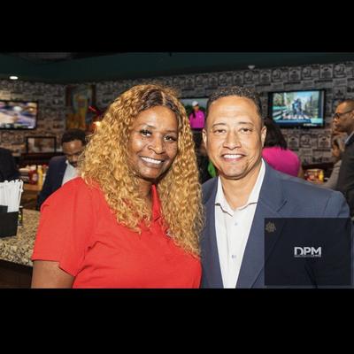 Two customers posing.