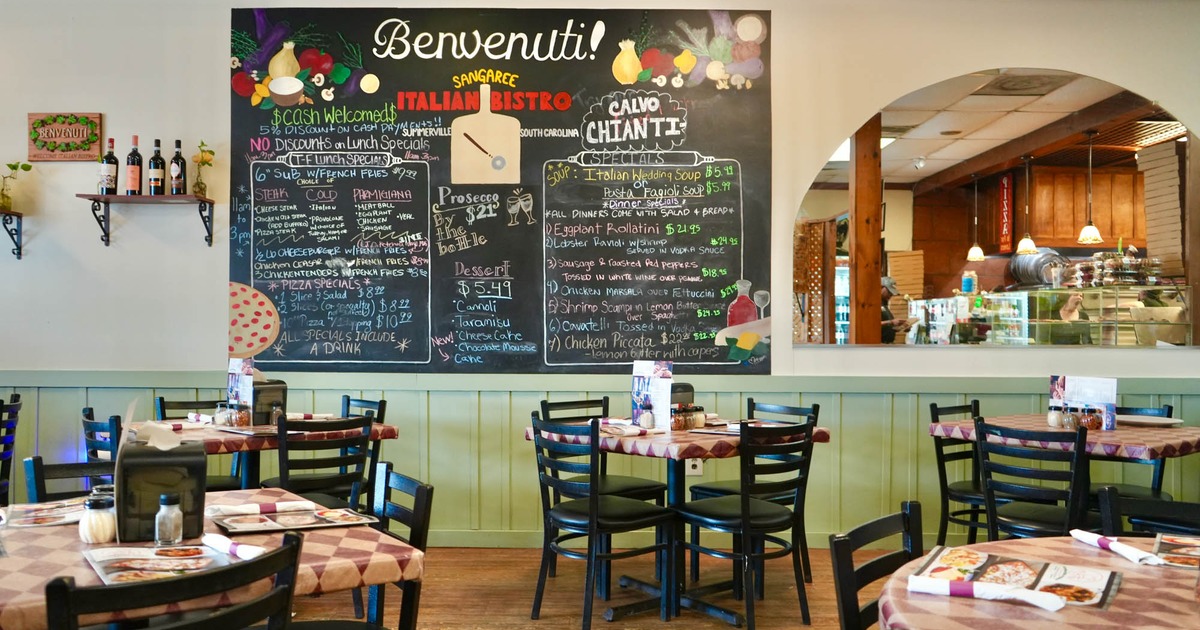 Interior seating area with chair and tables