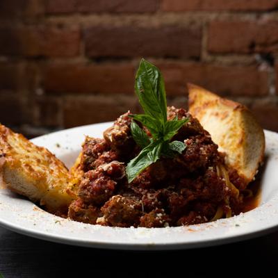 Linguine with Salsiccia sausage, served with toasted garlic bread.