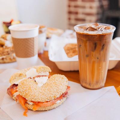 Sesame Bagel with Lox and a drink.