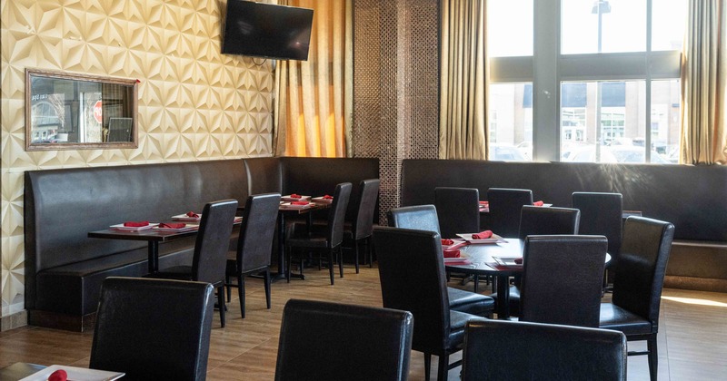 Interior, dining area with booths in the corner