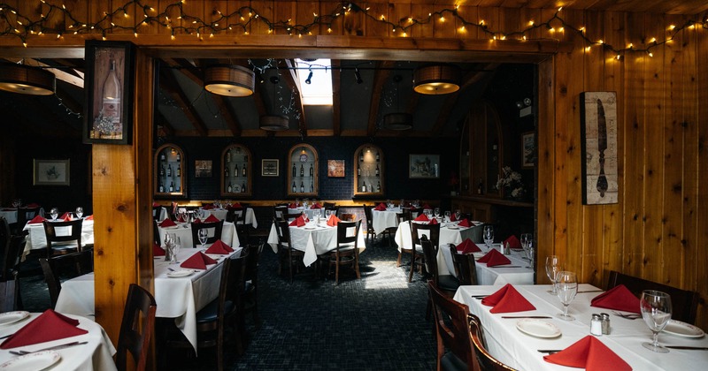 Interior, dining tables ready for guests