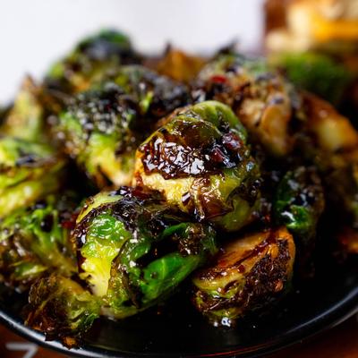 Roasted Brussels sprouts drizzled with a thick balsamic glaze.