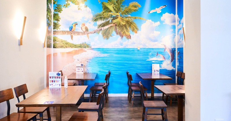 Interior, dining tables, chairs, wall mural