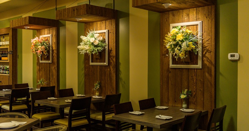 Restaurant interior, dining area, lined up dining tables