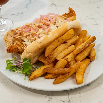 Catfish po boy with fries.
