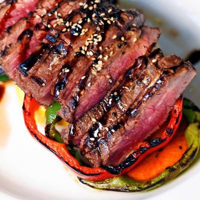 Served grilled steak.