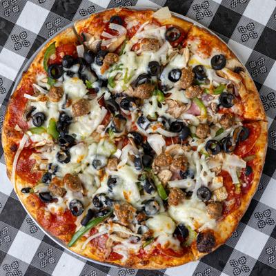 Pizza with sausage, cheese, onions, green peppers, and black olives.