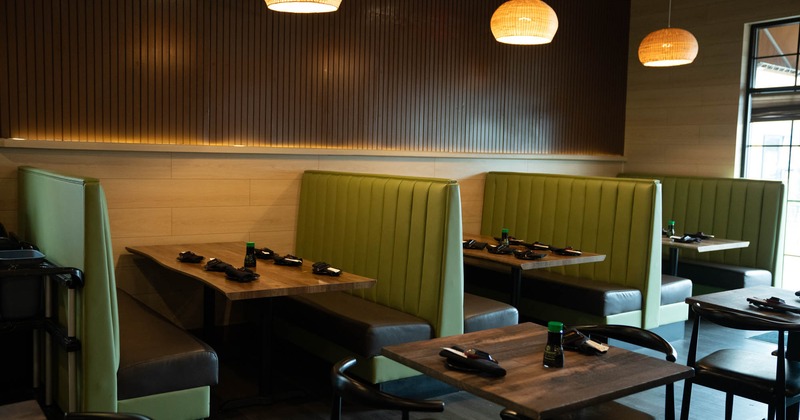 Interior, dining area, padded seating booths with tables, ready for guests