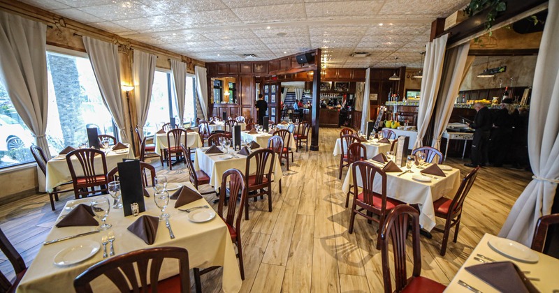 Dining area with fully set tables