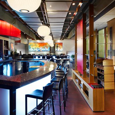 Interior, a bar and dining area in the background.