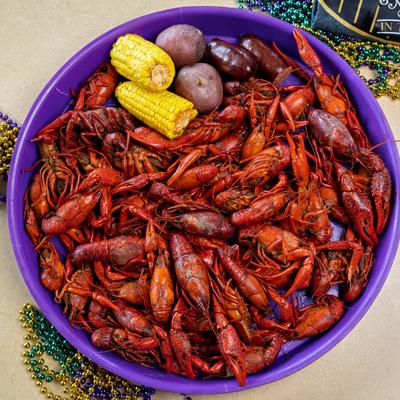 Crawfish Platter with potatoes and corn on a cob.