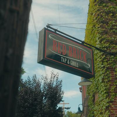 Exterior, Red Brick Tap and Grill signage.