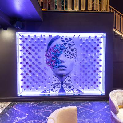 Interior, led light artwork on a wall in the seating area