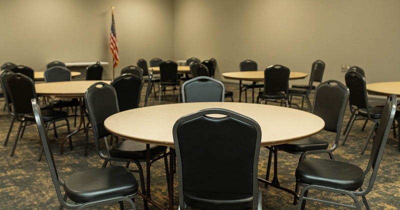 Interior, Kansas room, oval tables with chairs