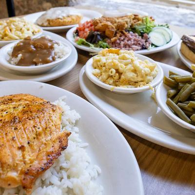 Assortment of dishes arranged on a wooden table.