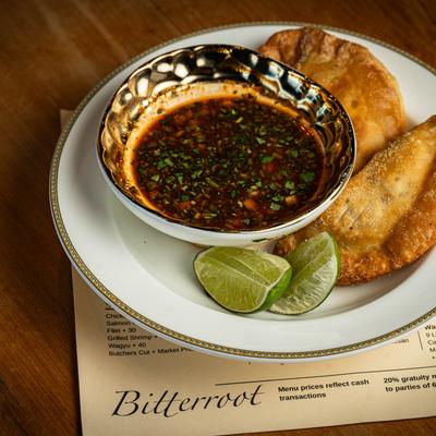 Birria sauce and pies.