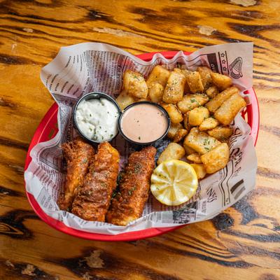 Bttered Alaskan cod served with traditional English chips, lemon and tartar sauce.