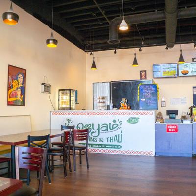 Diner area, tables, chairs, diner counter.