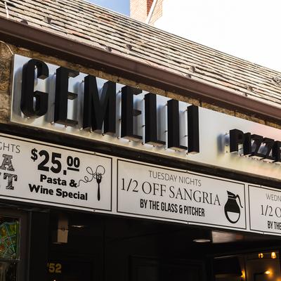 The name of the restaurant on the side of the building.