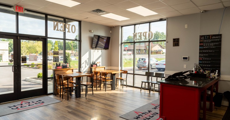 Dining tables by the big windows