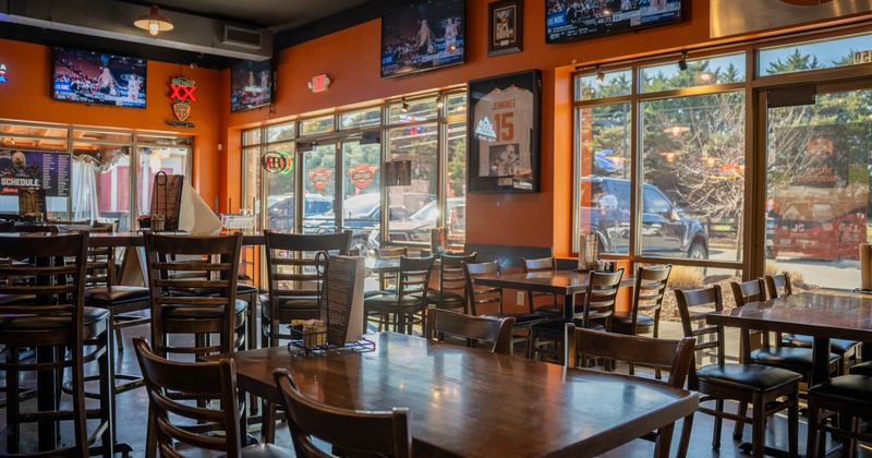 Interior, seating area with tables and chairs