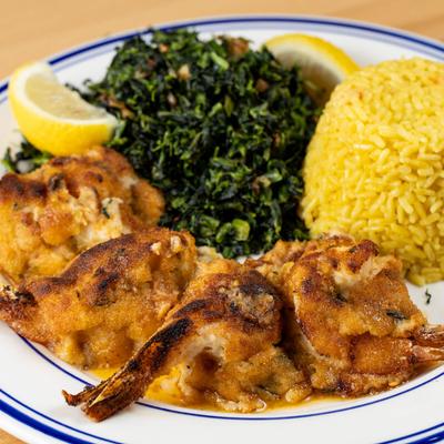 Stuffed shrimp, with rice and salad.