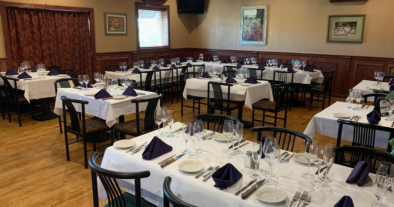 Set dining tables ready to receive guests