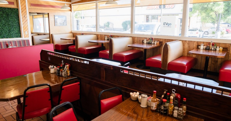 Interior, leather dining booths by the window