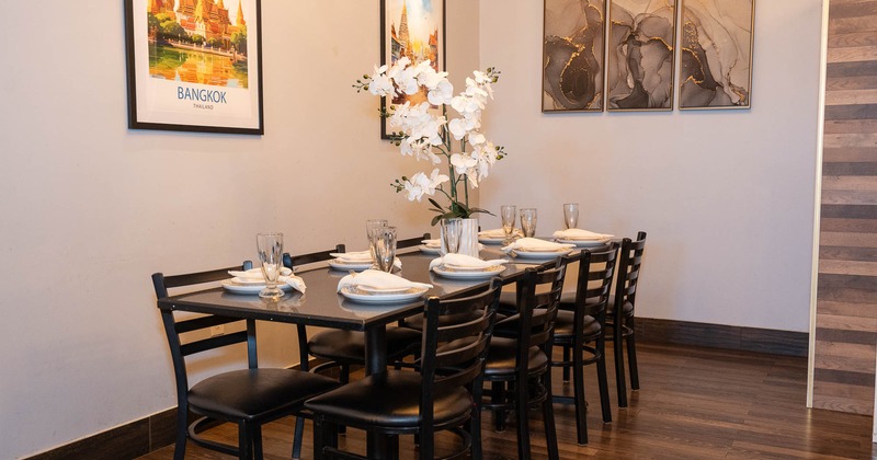 Interior, table set for guests in dining area