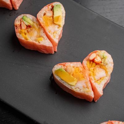 Pink Lady Roll wrapped in pink soybean paper in a shape of hart.