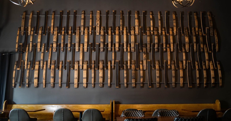 Table setting close up with blurred barrel racks in the background