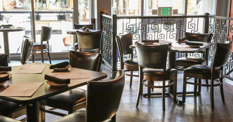 Interior dining area with set tables ready for guests