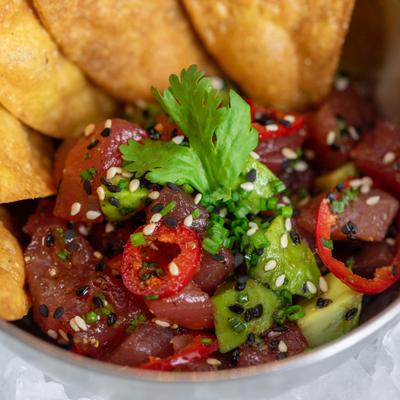 Ahi tuna, with ginger, avocado, chilies, sesame, soy, and chives.