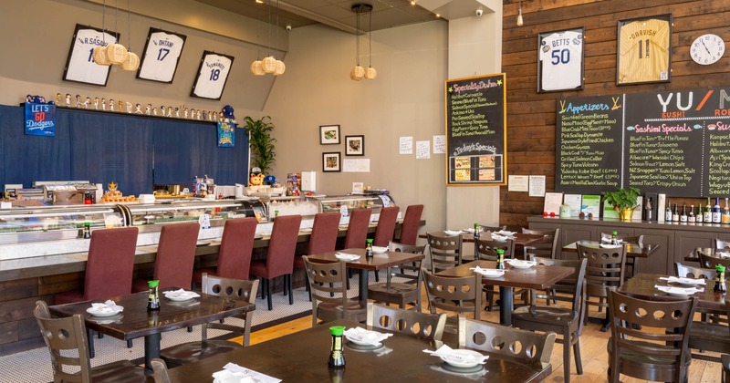 Inside, seating area, tables ready for guests