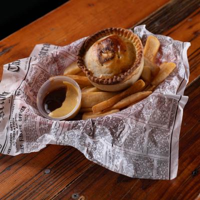 Beef onion meat pie and fries.