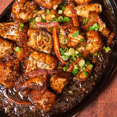 Caramelized catfish nuggets, close up.