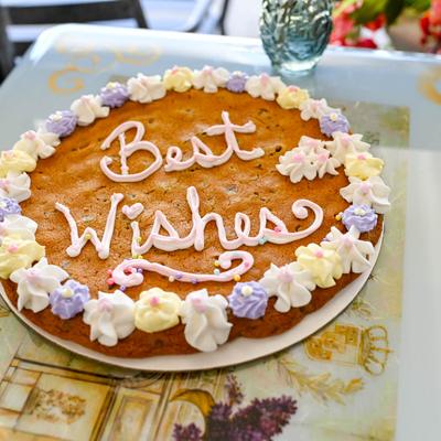 Cookie with Best Wishes lettering.