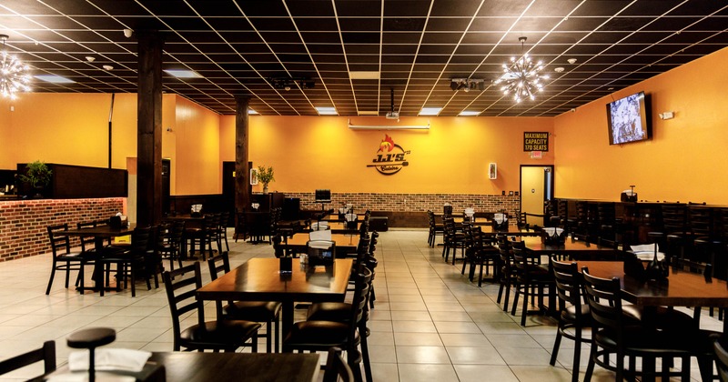 Interior, open space dining area, tables for four, ready for guests, tile flooring
